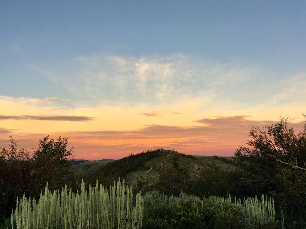 Sunset over rolling hills